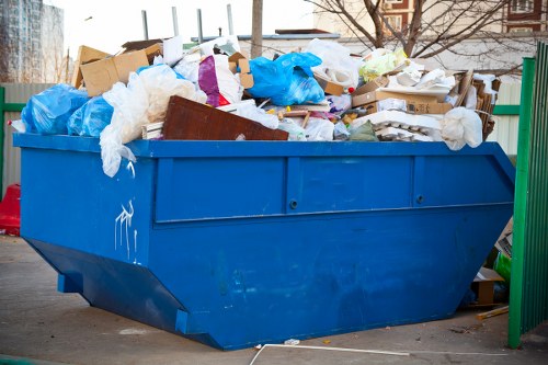 Photograph of a house clearance crew preparing to remove items from a property